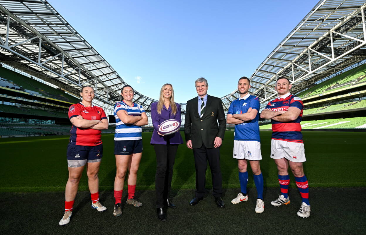 Energia's Lorna Danaher and IRFU President John O'Driscoll with the team captains