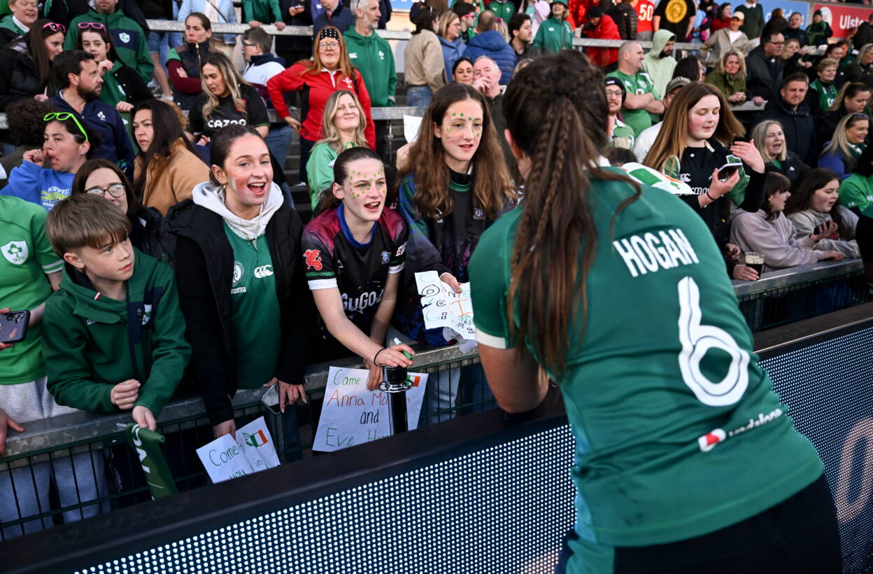 Brittany Hogan is pictured with fans after the win over Wales